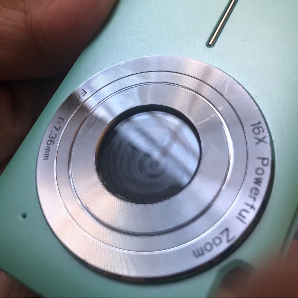 44.0 mega pixels 16x zoom turquoise camera